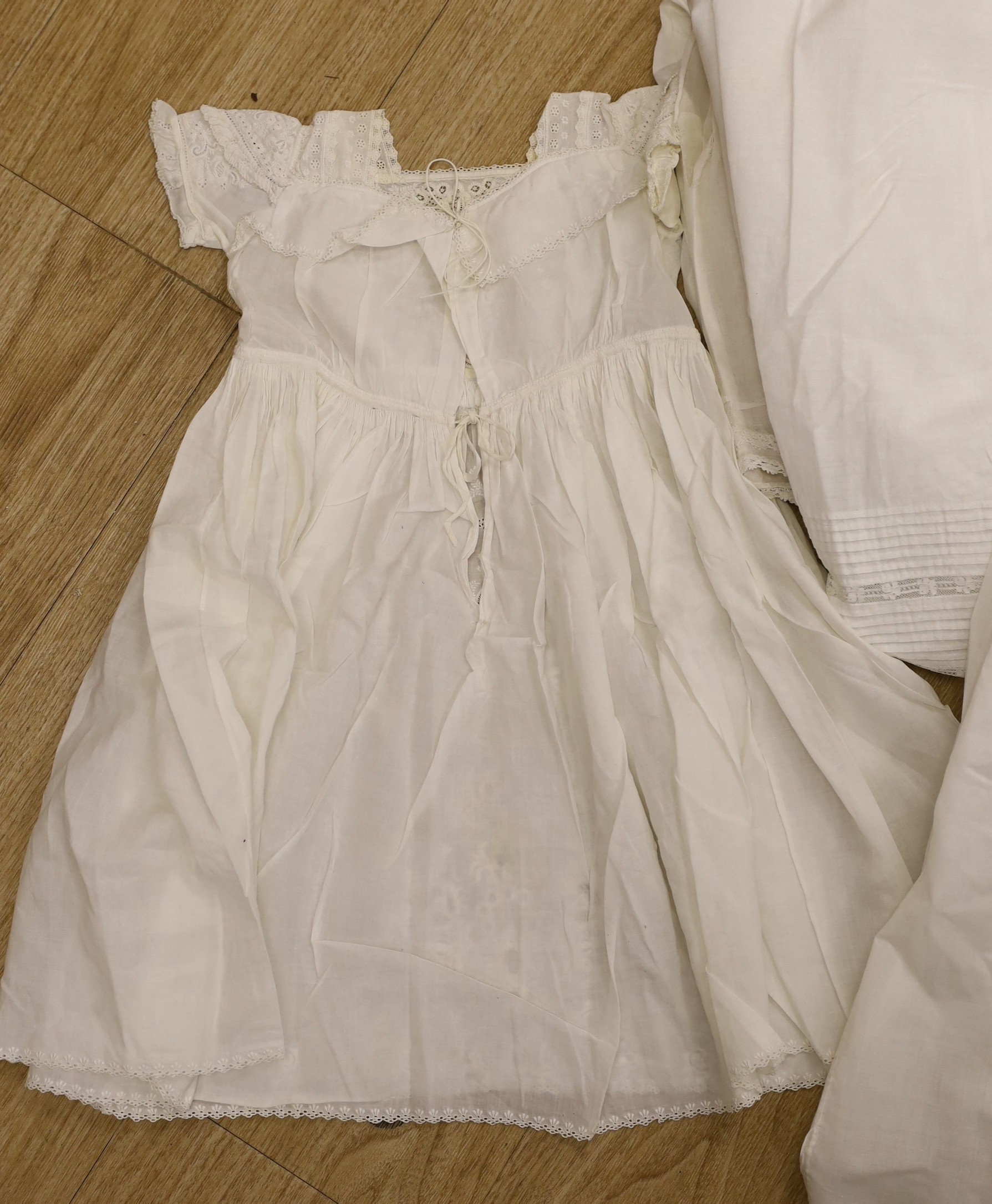 A 19th century Scottish Ayrshire, hand white worked christening gown and a similar baby dress, together with a collection of other 19 th century baby wear.